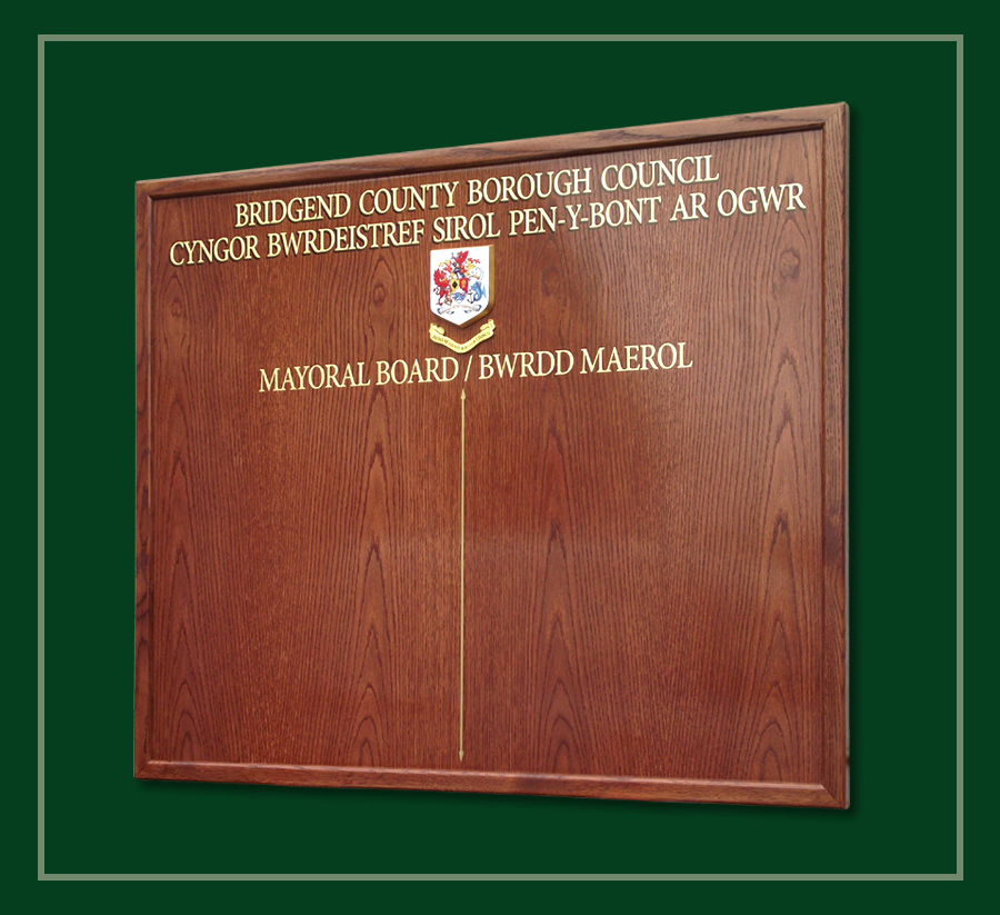 Oak framed made to match an existing Mayoral honours board.