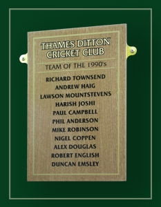 Small oak honours board listing top players of the 1980's.