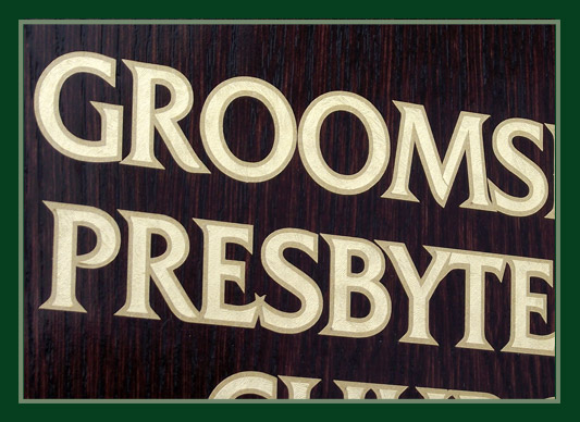 This close up of honours board lettering shows the two types of gold material used.