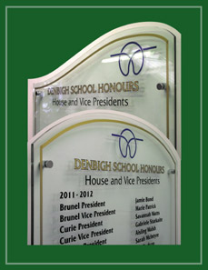 Shaped Perspex boards displaying Denbigh School House Presidents