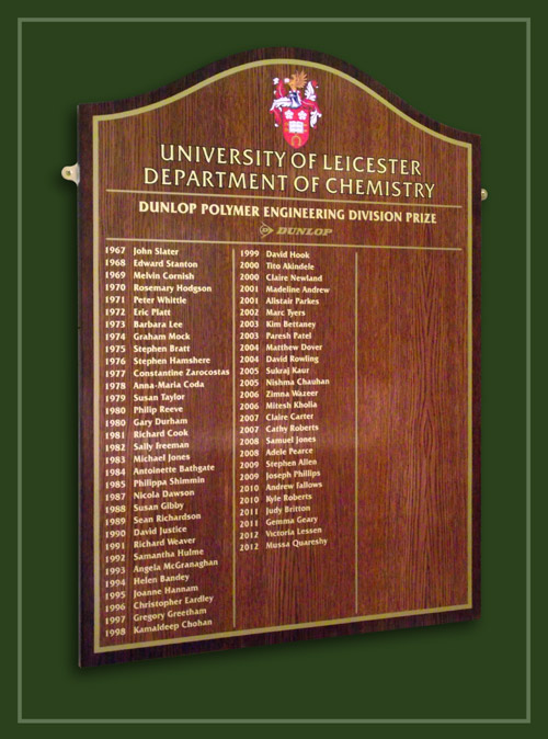 A hill shaped oak honours board showing Leicester University, Department of Chemistry award winners