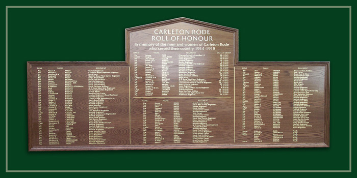 Golden oak Roll of Honour commemorating those who served in the Great War, World War One.