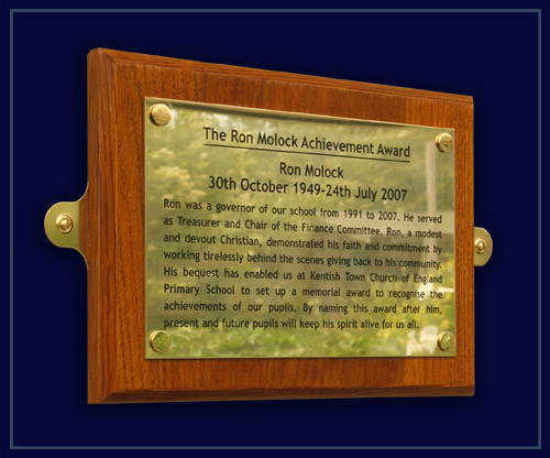 wood and brass memorial plaque