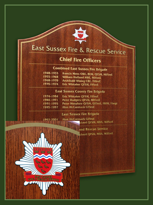 Medium red mahogany coloured rolls of honour boards produced for the East Sussex Fire & Rescue Service