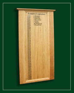 A light oak Golf Captains honour board framed in solid oak
