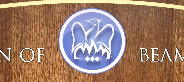 The school logo has been reproduced on the central oak panel using dye sublimation printing